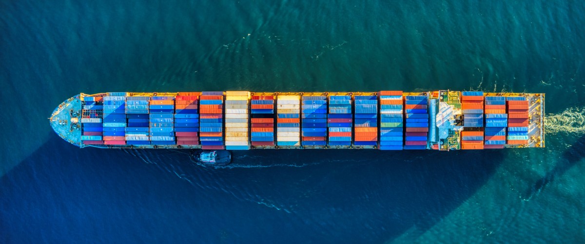 Aerial view of a container ship in the ocean